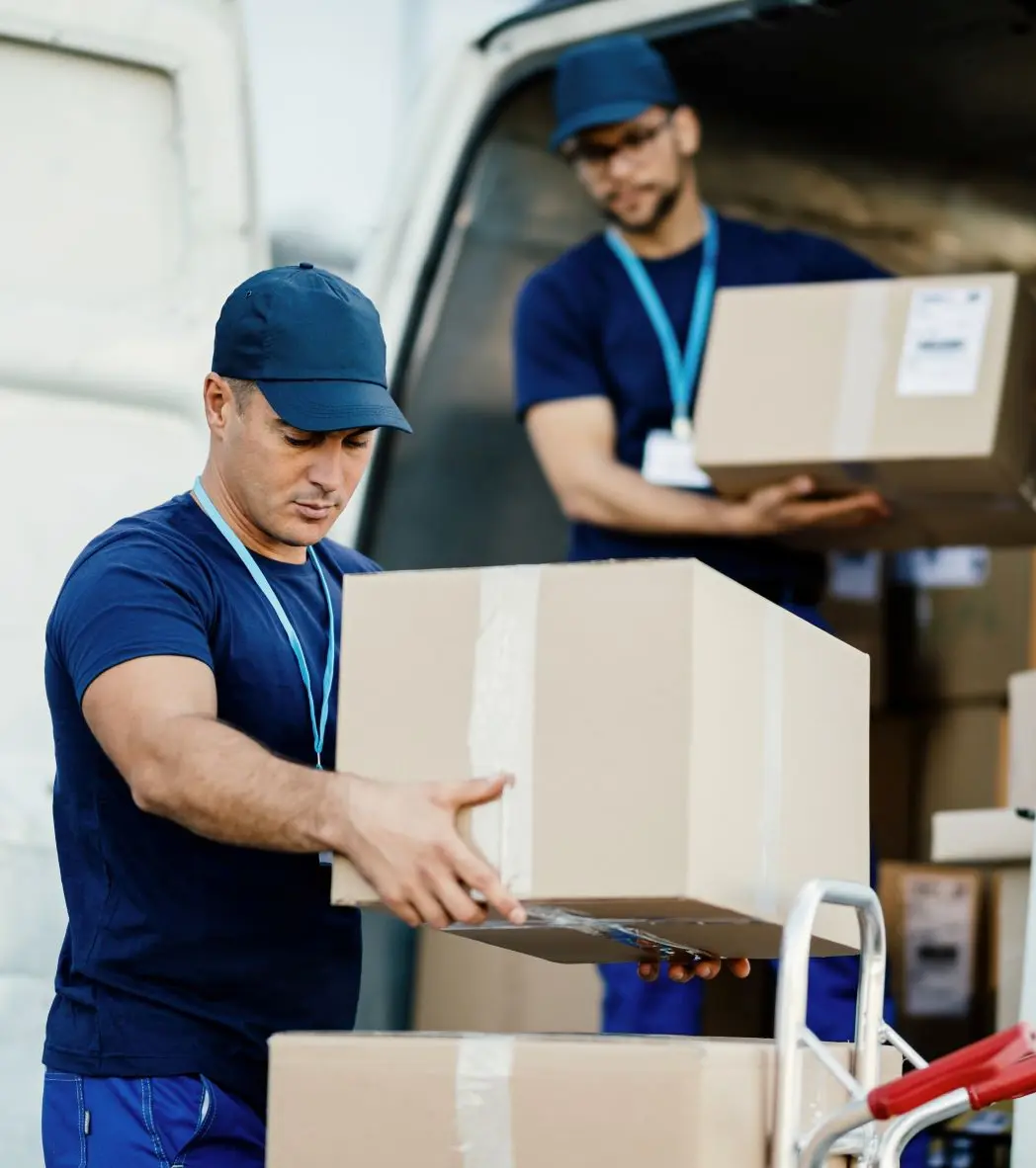 Distribution professionals handling shipments